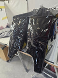 3D skull and crossbones stretching through stretched bags