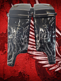 3D skull and crossbones stretching through stretched bags