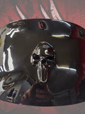 Punisher skull stretching through windshield