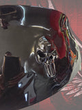 Punisher skull stretching through windshield