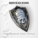 Side-mounted horn covers with skull warbonnet theme