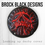 Looking up skull through on Harley Davidson derby cover