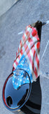 Tattered and worn full color flag Harley console